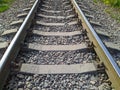 Old train rails in landscape in the summer season Royalty Free Stock Photo