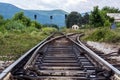 Traces of the Past: Old Train Rails Intersecting in Nature Royalty Free Stock Photo