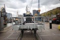 Old train wagon and crane on the quay in the harbor museum of Rotterdam Royalty Free Stock Photo