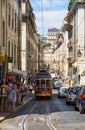 Old tram number 28 on the narrow street of Alfama. Lisbon. Portugal