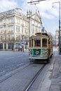 The old tram passes by the Aliados Avenue and Liberdade Square Royalty Free Stock Photo