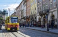 Old tram rides on the Market square in historical and tourist centre of the town in Lviv, Ukraine