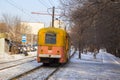 An old tram stands at a traffic light. Royalty Free Stock Photo