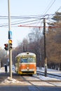 An old tram stands at a traffic light. Royalty Free Stock Photo