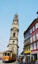 Old tram and tower of Clerigos in Porto Royalty Free Stock Photo