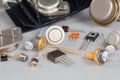 Old transistors various purpose in different packages on gray surface Royalty Free Stock Photo