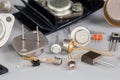 Old transistors various purpose in different packages on gray surface Royalty Free Stock Photo