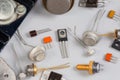 Old transistors various purpose in different packages on gray surface Royalty Free Stock Photo