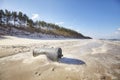 Trash can on a beach, environmental pollution concept Royalty Free Stock Photo