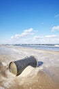 Trash can on a beach, environmental pollution concept Royalty Free Stock Photo