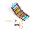 Old travel sewing kit isolated on white background Royalty Free Stock Photo