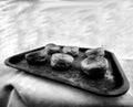 Old tray with yorkshire pudding - This black and white camera obscura photo is NOT sharp due to camera characteristic. Taken on Royalty Free Stock Photo