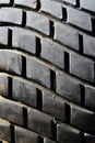 Old tread pattern for vehicle. Car wheel abrasion reduces safety. Close up Royalty Free Stock Photo