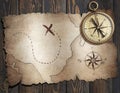 Old treasure pirates` map with compass on wood table. 3d illustration. Royalty Free Stock Photo