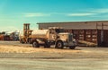 Old Truck Against a California Rural Landscape and Old Agricultural Barns