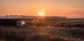 Old truck on a foggy farm field at sunrise Royalty Free Stock Photo