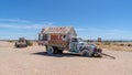 Old truck painted with Bible verses at Leonard Knight`s Salvation Mountain. Niland, California Royalty Free Stock Photo