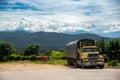 Old truck parked on a road with mountain ranges in the background. Colombia. Royalty Free Stock Photo