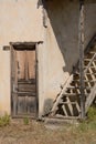 Old Trukish village house with a corner door and a staircase