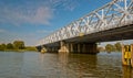 An old truss bridge over a Dutch river Royalty Free Stock Photo