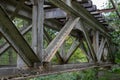 The old truss of the railway bridge. Steel construction connected by rivets. Royalty Free Stock Photo