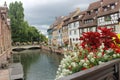 Old tudor style houses at the river in Colmar