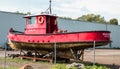 Old tug boat taken out of the water for dismemberment -3