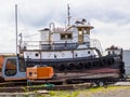 Old tug boat taken out of the water for dismemberment -2