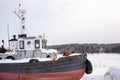 Old Tug Boat in Winter with Copy Space Royalty Free Stock Photo