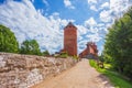 Old Turaida castle with tower in a sunny day. Summer landscape. Gauja national park, Sigulda, Latvia Royalty Free Stock Photo