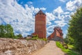 Old Turaida castle with tower in a sunny day. Summer landscape. Gauja national park, Sigulda, Latvia Royalty Free Stock Photo