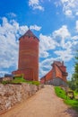 Old Turaida castle with tower in a sunny day. Summer landscape. Gauja national park, Sigulda, Latvia Royalty Free Stock Photo