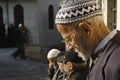 Old Turkish men in the courtyard of a mosque in Antakya, Turkey