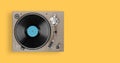 Old turntable player with lp vinyl record top view Royalty Free Stock Photo