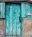 The Old turquoise Door with Cracked Paint Background Royalty Free Stock Photo