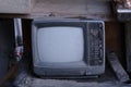 old TV. Antique screen in the dust, stands at the flea market. Royalty Free Stock Photo