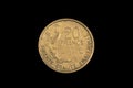 An old French franc coin isolated on a black background Royalty Free Stock Photo