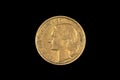 An old French franc coin isolated on a black background Royalty Free Stock Photo