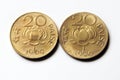 Old twenty Paise nickel brass round coins of India 1969 & 1970 with lotus flower engraved on white background.