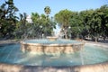 Old two-story fountain with a stone pool