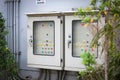 Old type electrical control box, large wall mounted box in the park Next Royalty Free Stock Photo