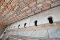 Old type toilets in the ancient city of Ephesus, Aydin, Turkey