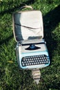 Old typewriter on the grass