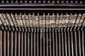 Old typewriter letters on type bar Royalty Free Stock Photo