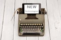 old typewriter and new tablet pc with words & x22;NEW Technologies& x22;