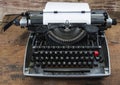 Old typewriter from seventies with paper and copy space Royalty Free Stock Photo