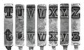 Old Typewriter Typebar Letters T to Z Isolated on White Royalty Free Stock Photo