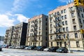 Old typical apartment buildings in Harlem, New York City, USA