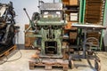 Old typography printing machine with letter samples. Royalty Free Stock Photo