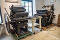 Old typography printing machine with letter samples. Royalty Free Stock Photo